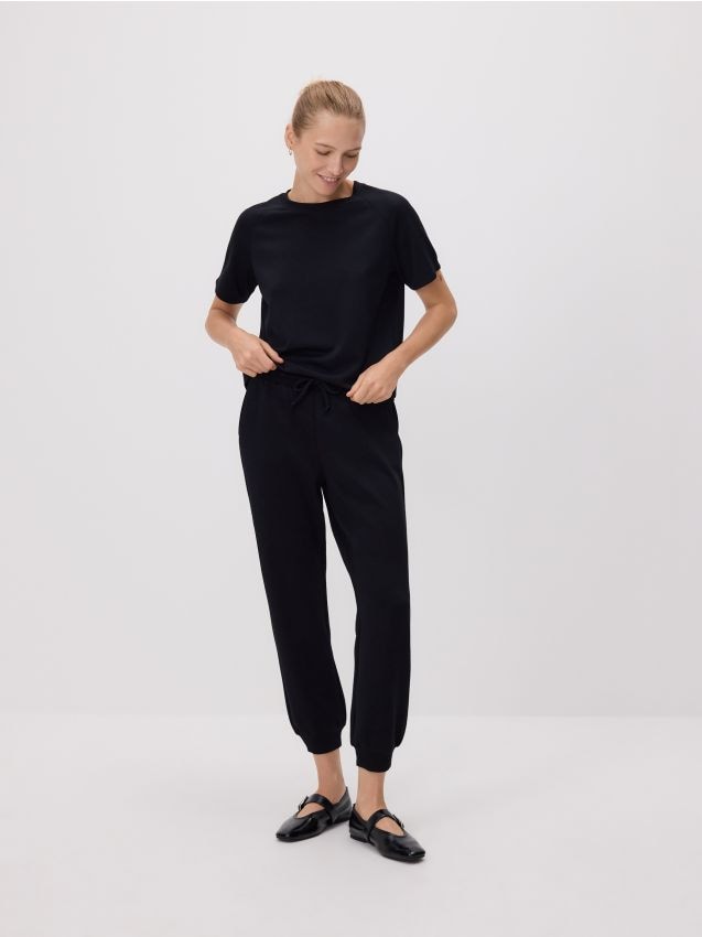 Reserved - Dresowe spodnie z modalem - czarny