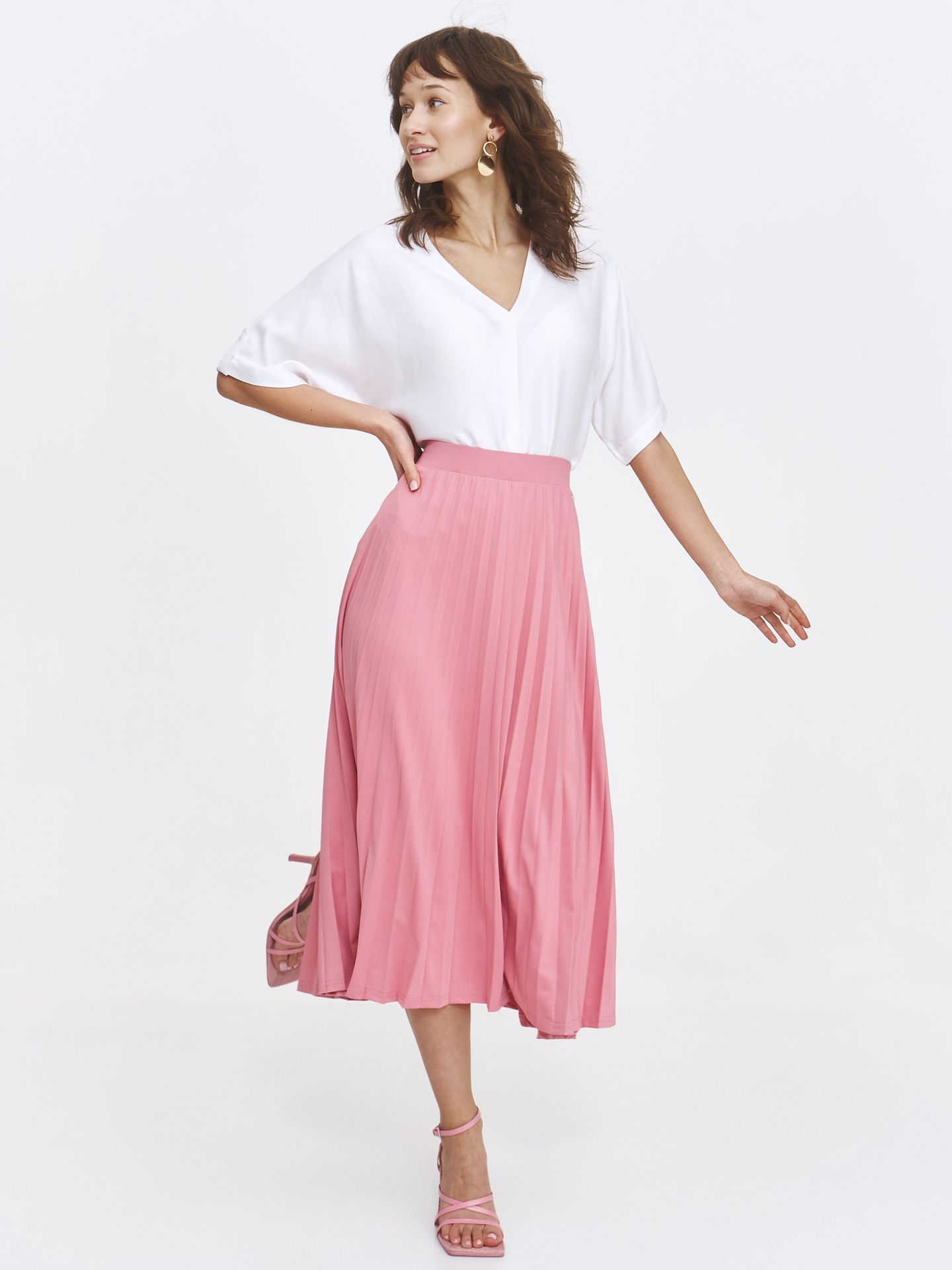 Jasnoróżowa elegancka spódnica midi