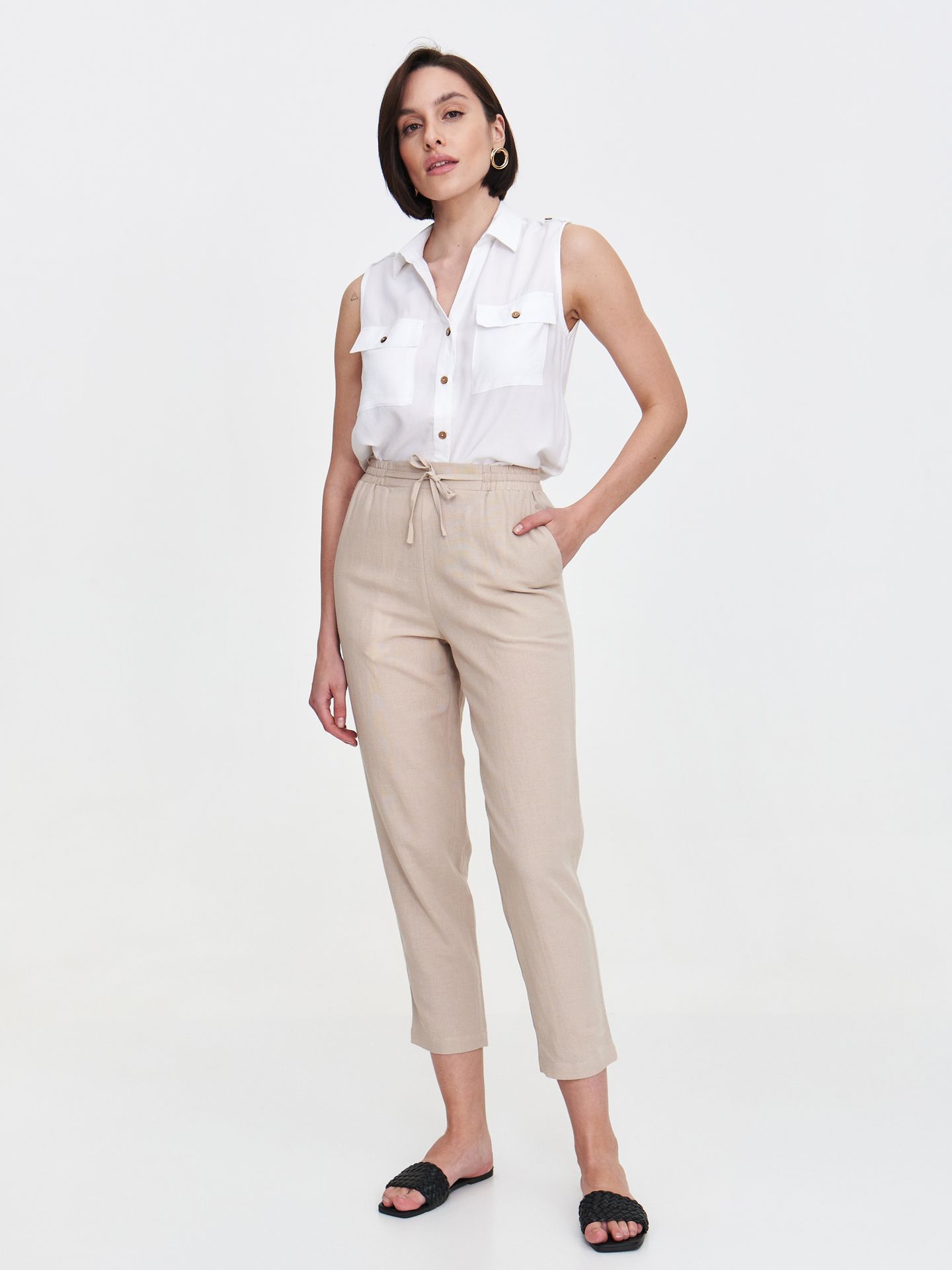 Tkaninowe beżowe spodnie typu chino