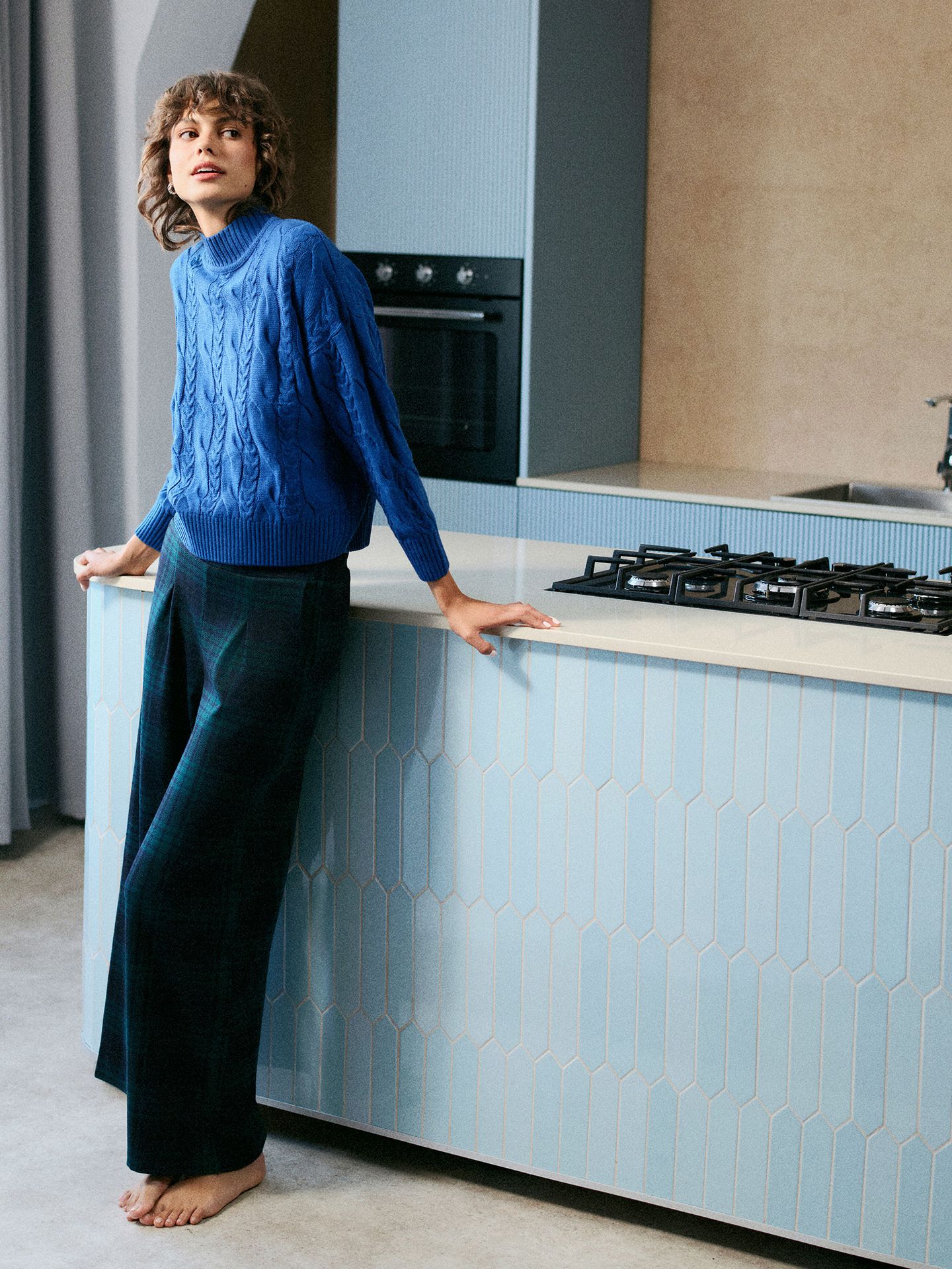 Spodnie w kratę z zakładkami