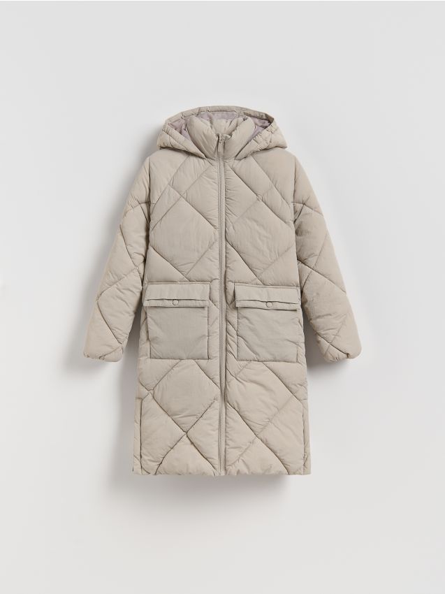 Reserved - Długi pikowany płaszcz z kapturem - beżowy