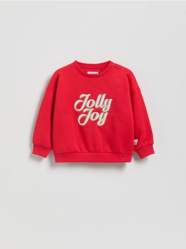 Reserved - Bluza ze świątecznym napisem - czerwony