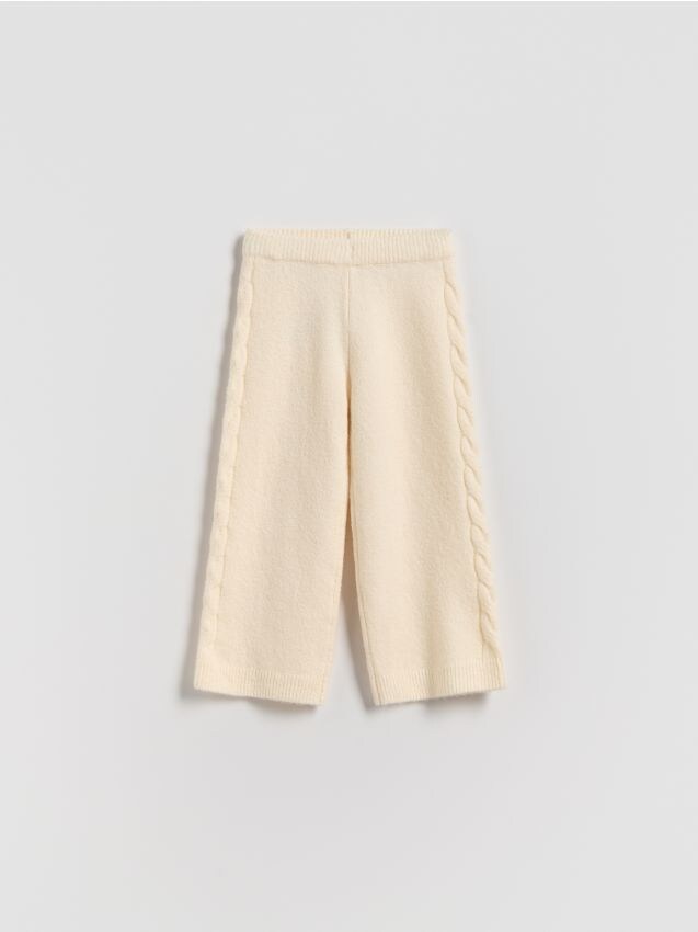 Reserved - Dzianinowe spodnie - kremowy