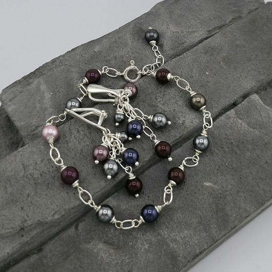 Srebrne klipsy i bransoletka z perłami