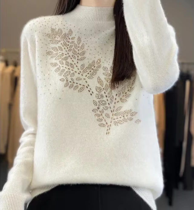 Sweter damski z ozdobnymi cekinami - Biały M