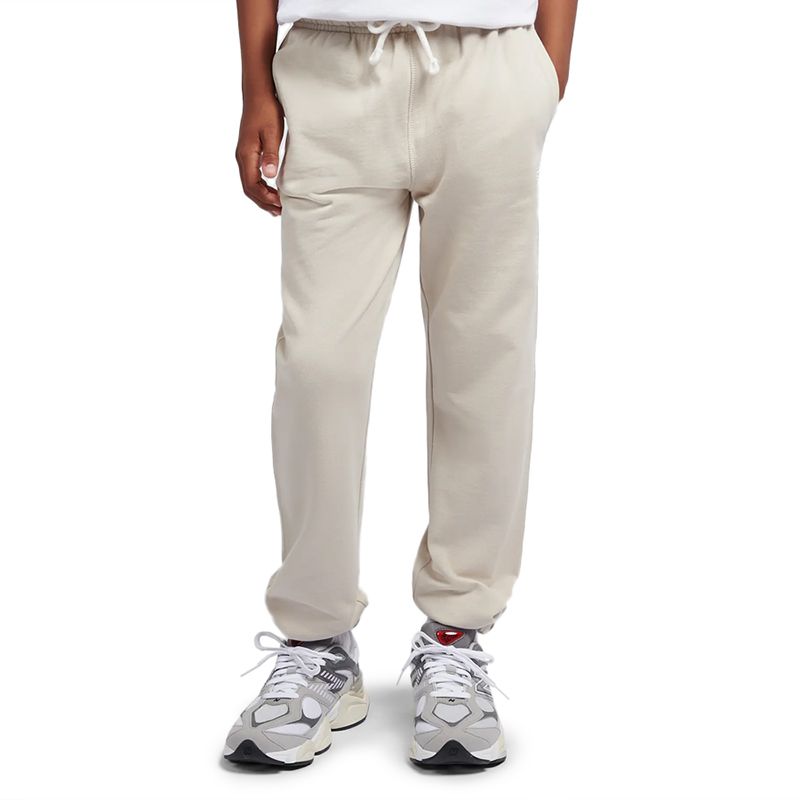 Spodnie dziecięce New Balance LAKB0060TWF - beżowe