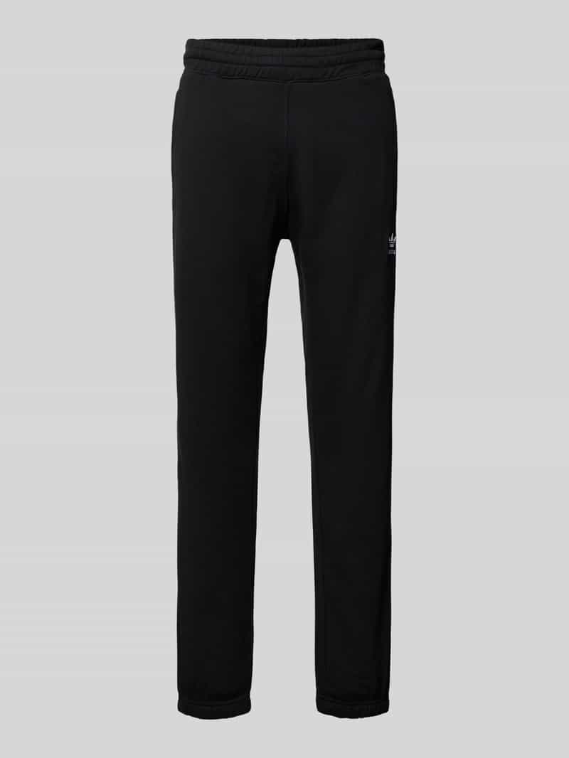 Spodnie dresowe z wyhaftowanym logo i elastycznym pasem