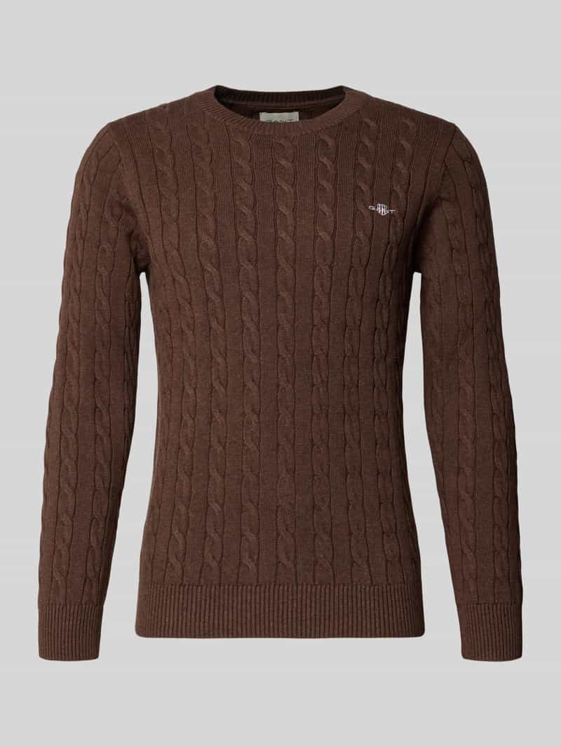 Sweter z dzianiny ze ściegiem warkoczowym i wyhaftowanym logo