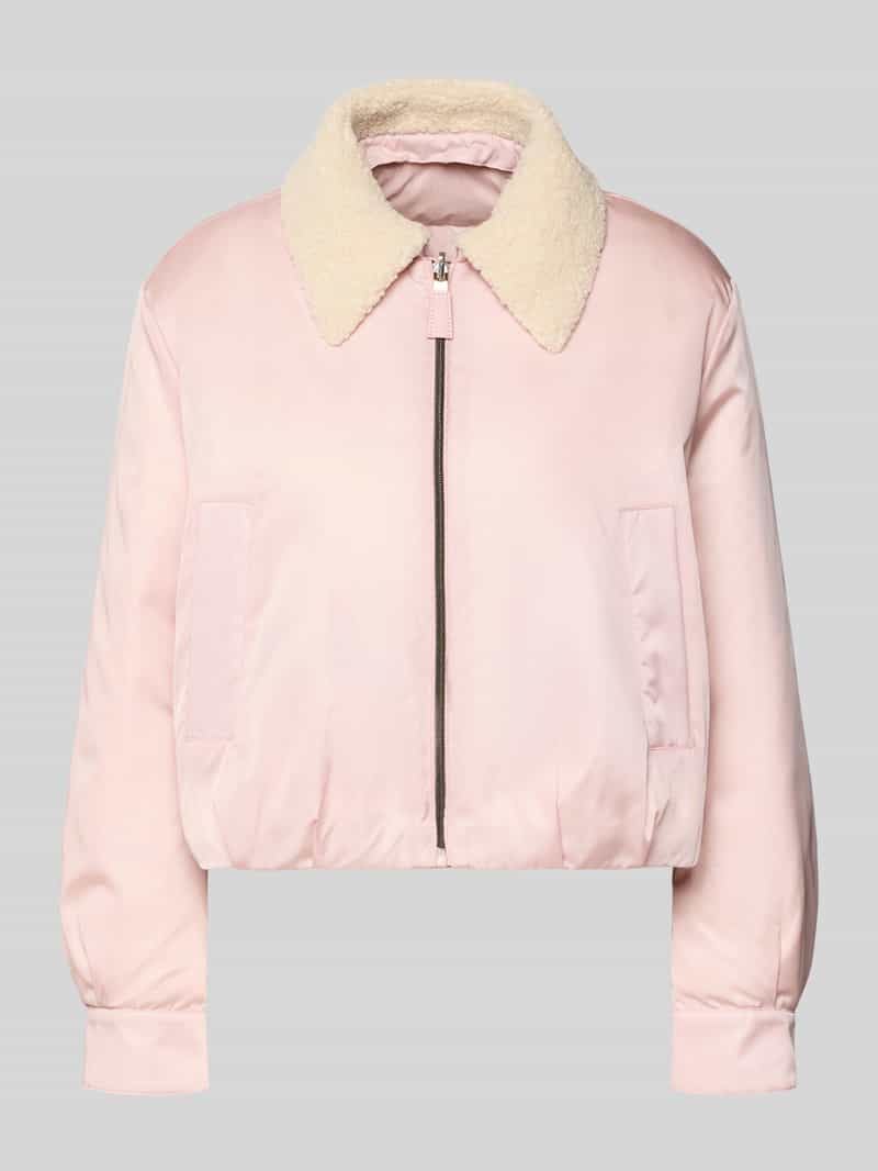 Kurtka puchowa z wpuszczanymi kieszeniami