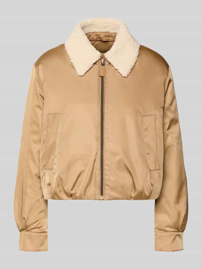 Kurtka puchowa z wpuszczanymi kieszeniami