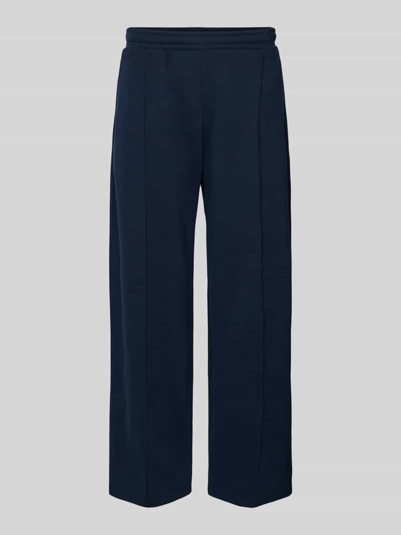 Spodnie dresowe z zaszewką i emblematem w stylu college