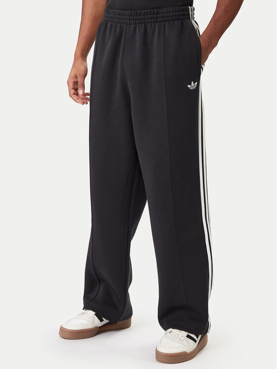 adidas Spodnie dresowe adicolor Spacer Track JX1506 Czarny Baggy Fit