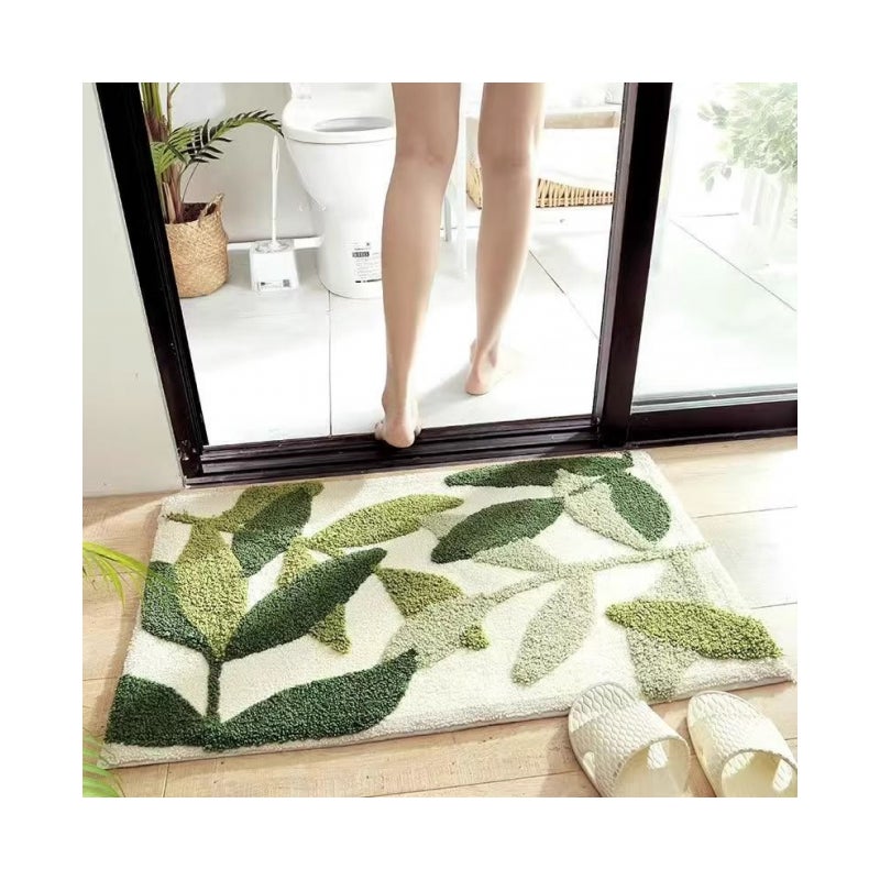 Mata łazienkowa antypoślizgowa, supermiękka i chłonna, ze wzorem zielonych liści.