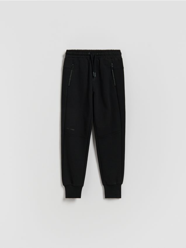 Reserved - Bawełniane spodnie jogger - czarny