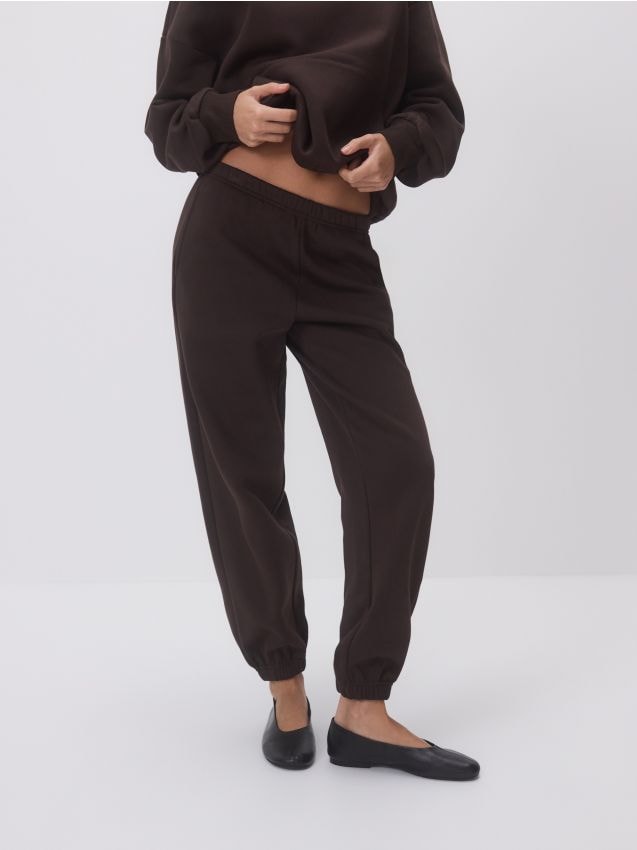 Reserved - Spodnie dresowe z bawełną - ciemnobrązowy