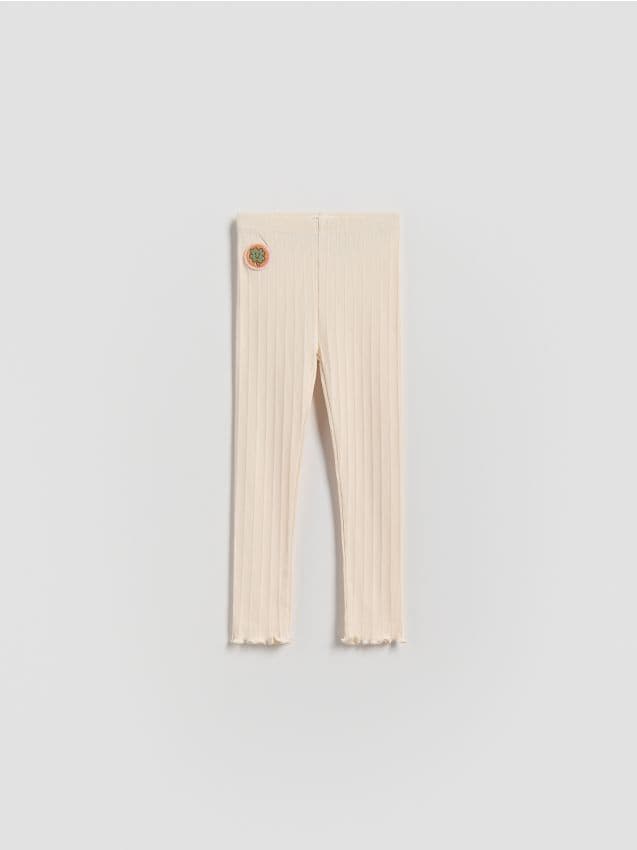 Reserved - Prążkowane legginsy - kremowy