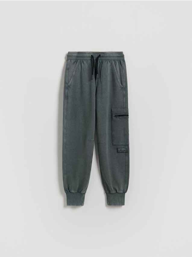 Reserved - Spodnie z efektem sprania - jasny zielony