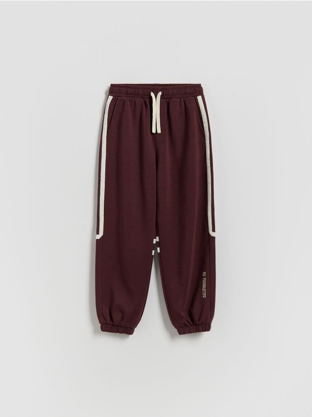 Reserved - Bawełniane spodnie - bordowy