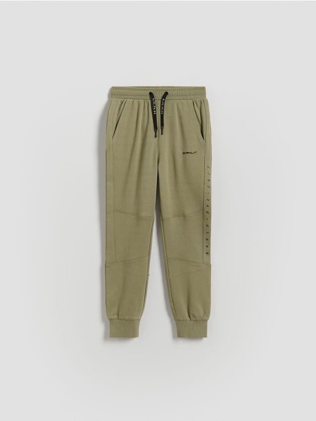 Reserved - Bawełniane joggery - jasny zielony