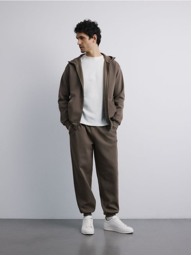 Reserved - Spodnie dresowe comfort fit - jasny zielony