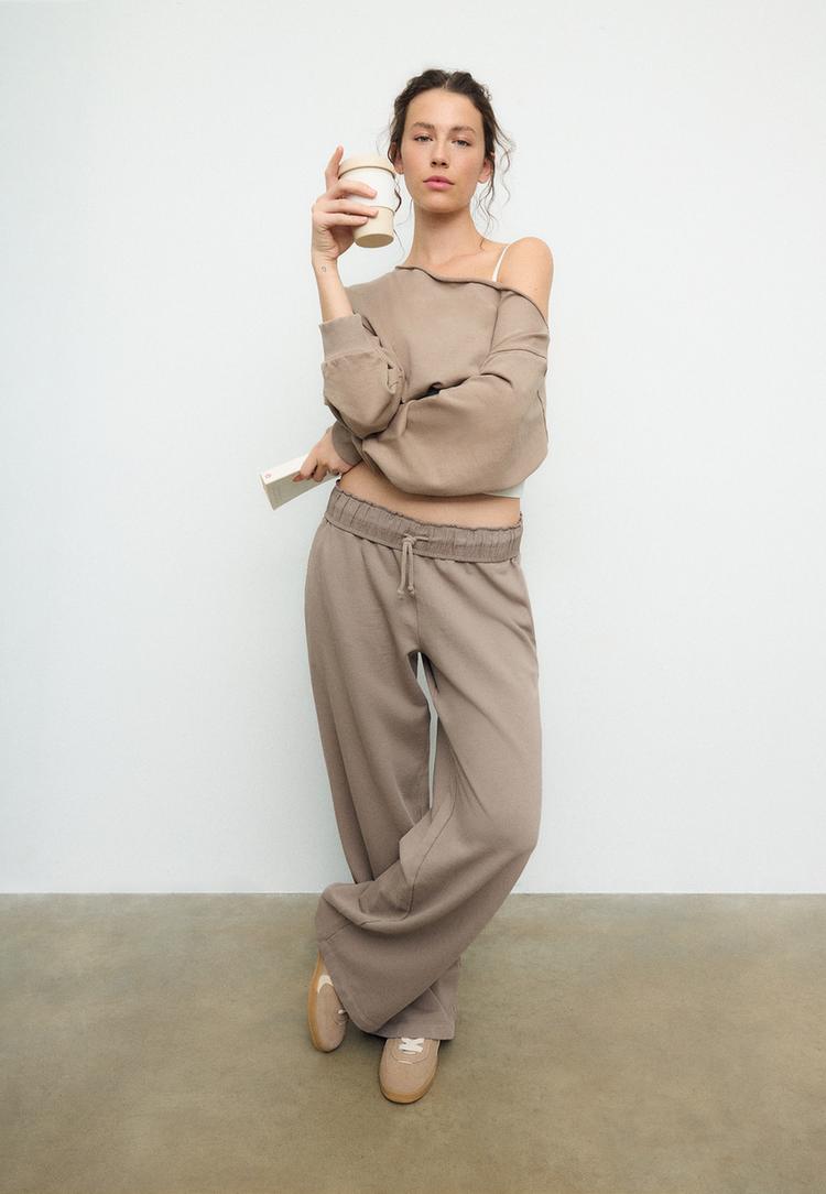 Stradivarius Proste joggery z efektem sprania Beżowy XL