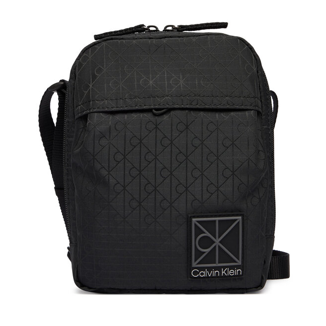 Saszetka Calvin Klein Utility Emblem Reporter LV04D3303G Czarny