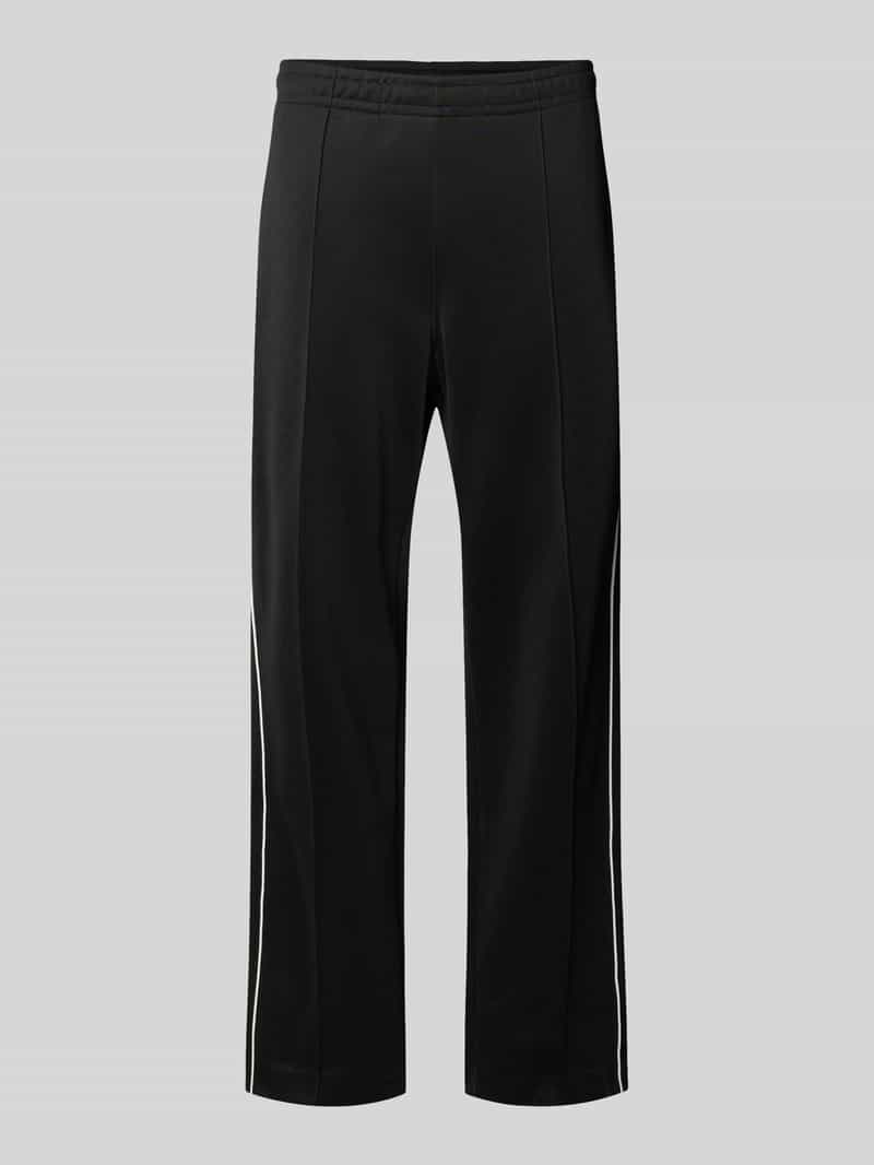 Spodnie dresowe o kroju regular fit z dodatkiem bawełny