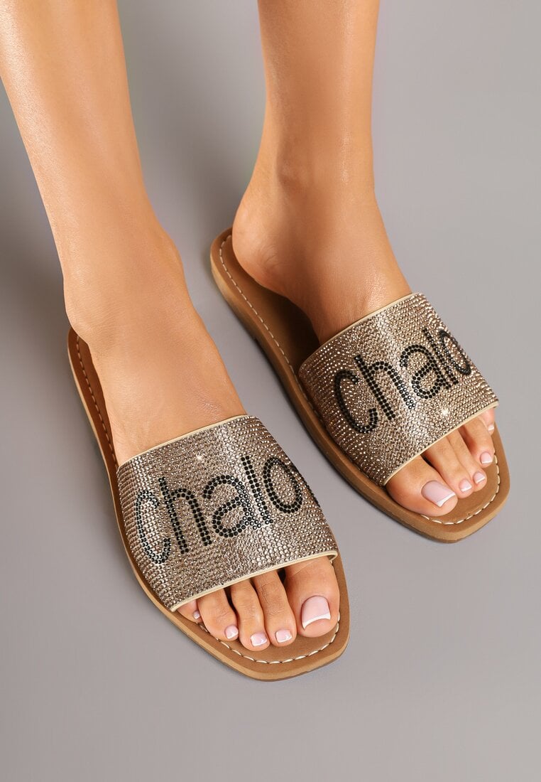 Złote Klapki na Płaskiej Podeszwie z Napisem Tulevelis