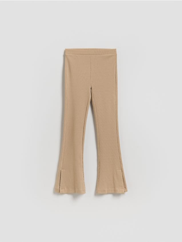Reserved - Prążkowane legginsy flared - beżowy