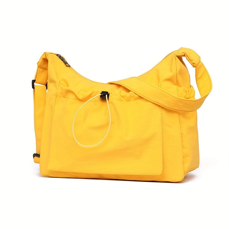 TEMU Ta damska torebka na ramię w minimalistycznym stylu w jednolitym kolorze posiada wiele przegródek i ma przestronną konstrukcję, dzięki czemu