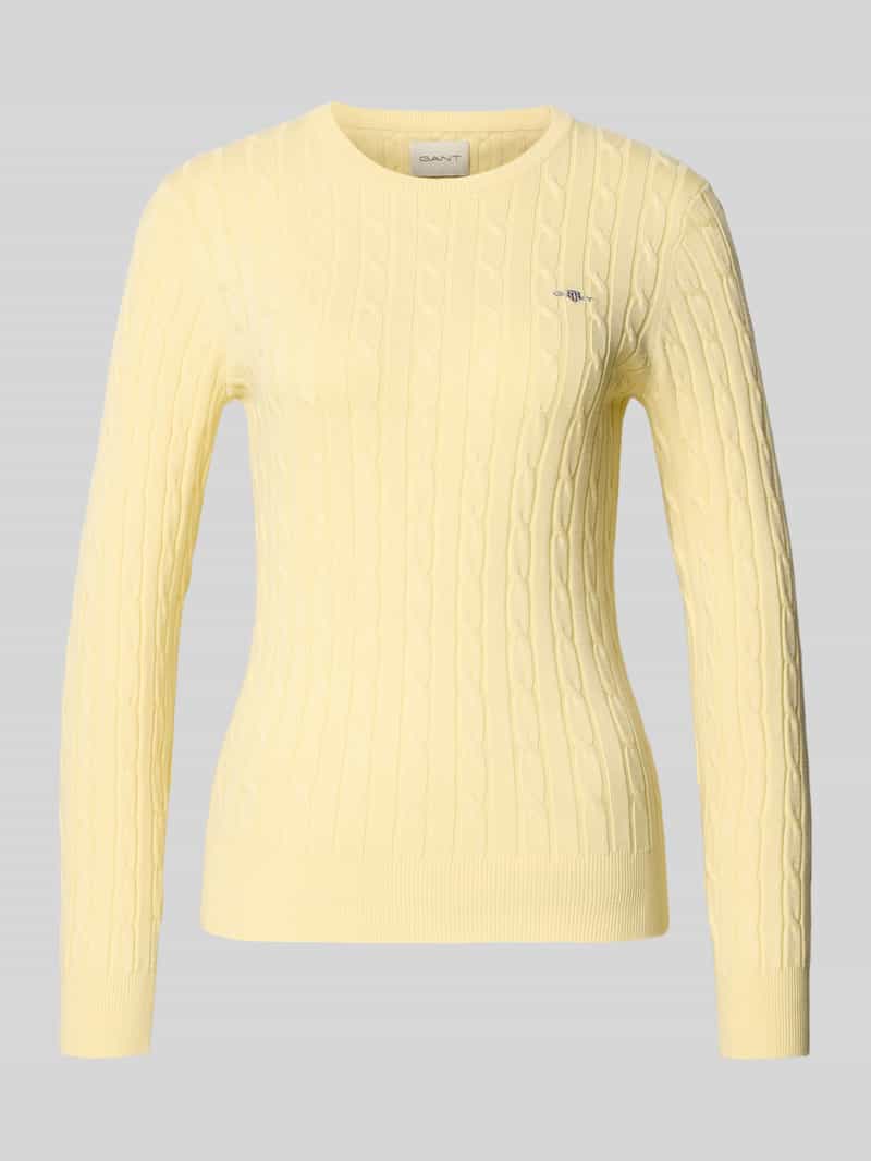 Sweter z dzianiny ze ściegiem warkoczowym i wyhaftowanym logo