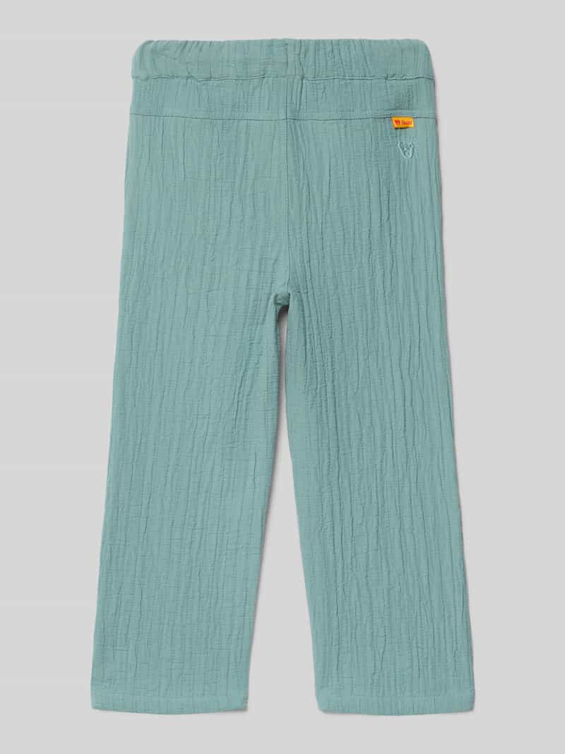 Spodnie z wpuszczanymi kieszeniami i haftem