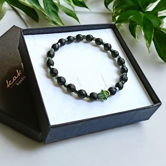 HAMSA - ochrona - fasetowany onyks mat, hematyt emerald