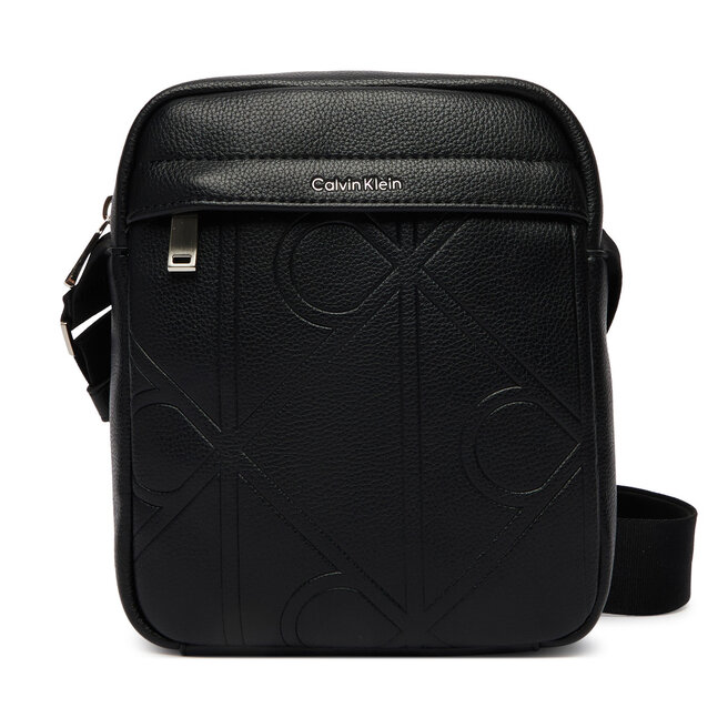 Saszetka Calvin Klein Emblem Aop Emboss Reporter LV04D3331G Czarny