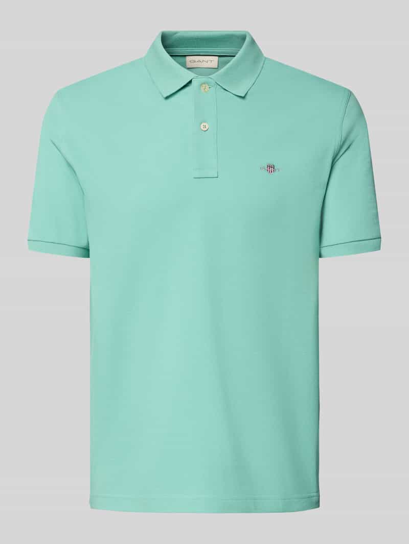 Polówka o kroju slim fit z haftowanym logo