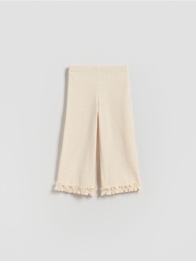 Reserved - Prążkowane spodnie - złamana biel