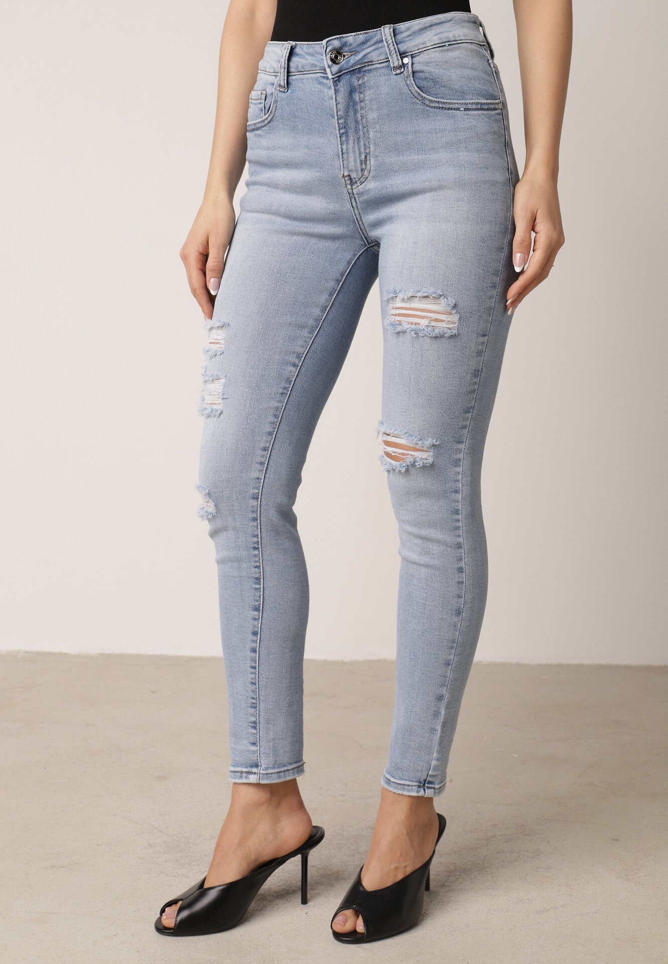 Niebieskie Bawełniane Jeansy o Kroju Slim z Przetarciami Elledima