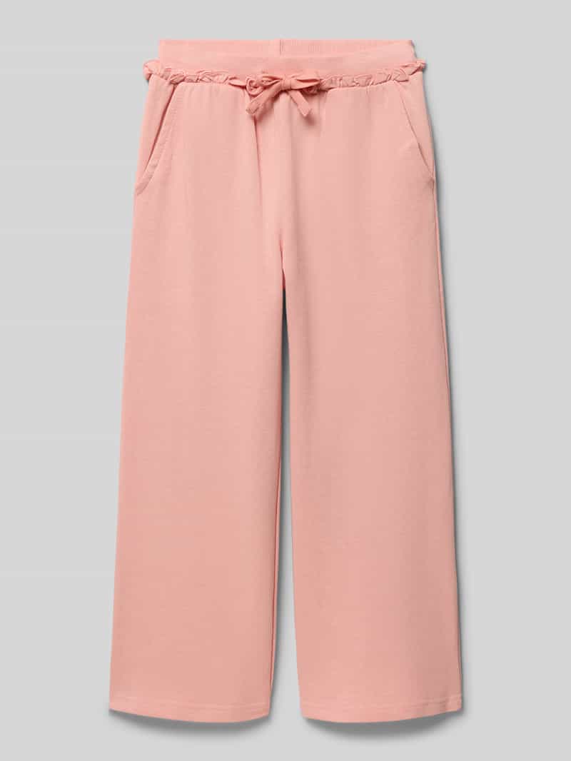 Spodnie dresowe w kroju wide fit z falbankowym wykończeniem