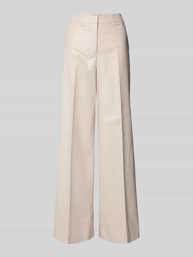 Spodnie lniane z kantami i wpuszczanymi kieszeniami