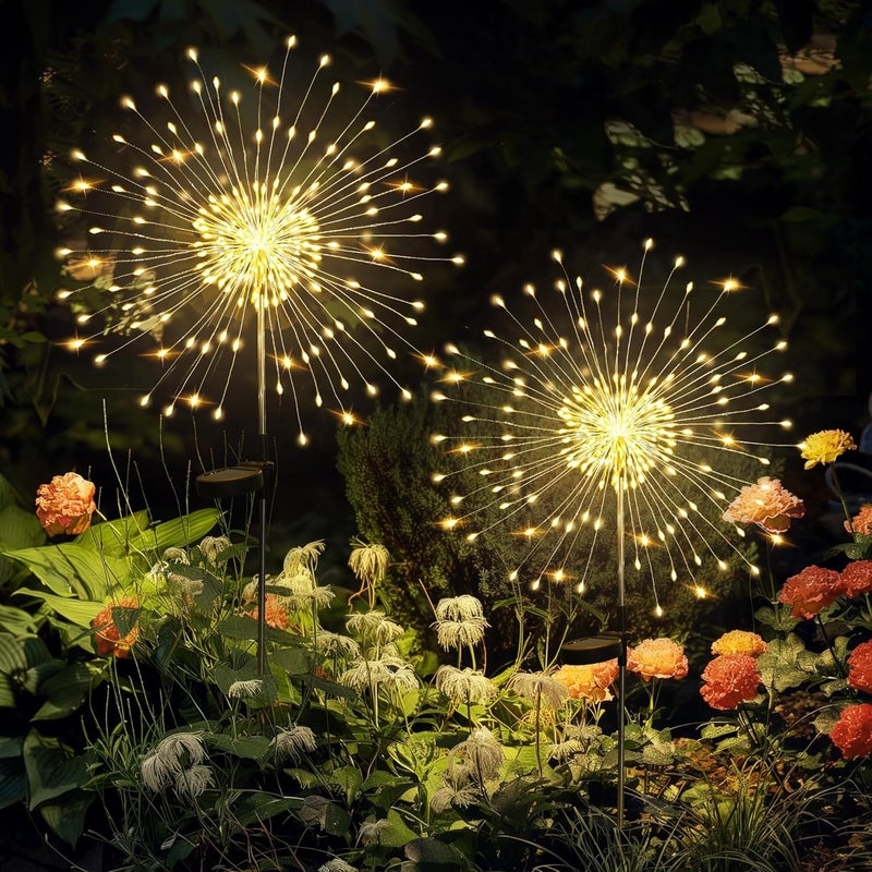 Zestaw dwóch zewnętrznych lamp solarnych, każda wyposażona w 120 żarówek LED, z wzorem dmuchawców, odpowiednich do ogrodów (ciepłe, białe światło).