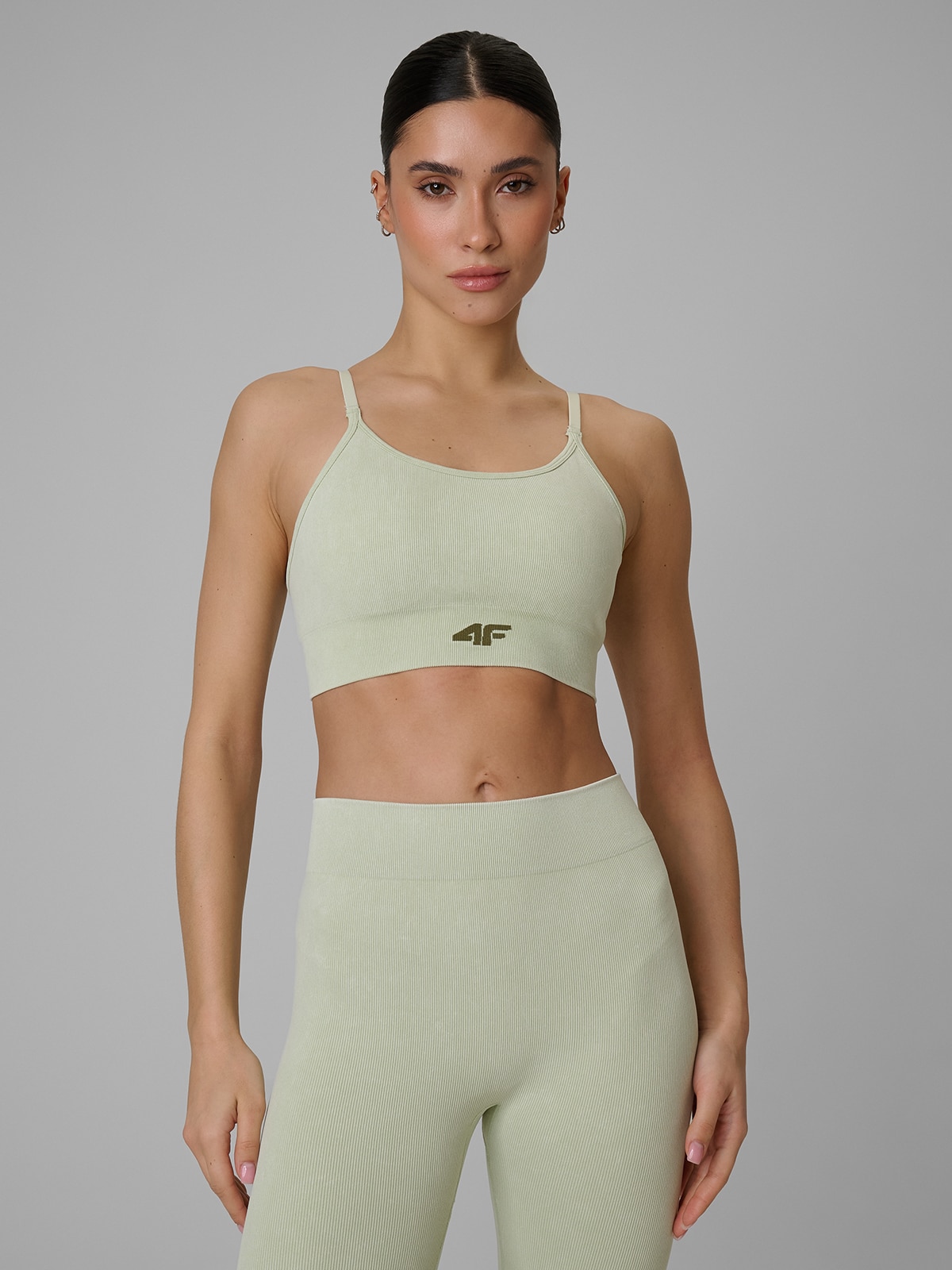 4F Biustonosz treningowy bezszwowy z niskim wsparciem damski - zielony XS/S