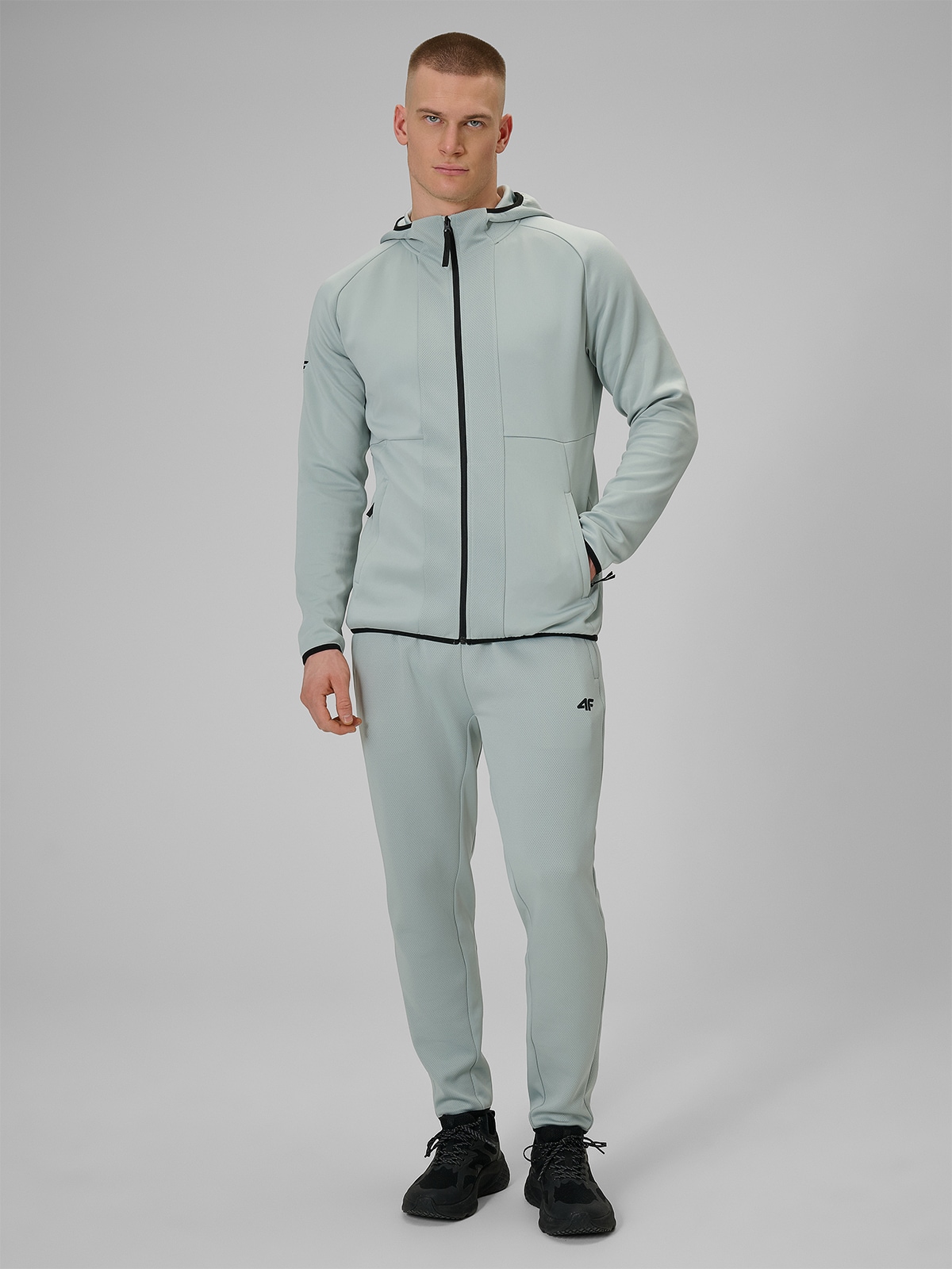 4F Spodnie treningowe szybkoschnące męskie - miętowe XXL