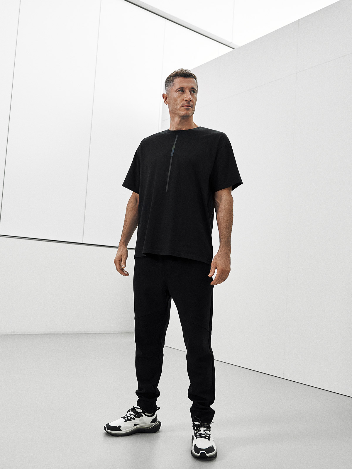 4F T-shirt loose z nadrukiem męski 4F x Robert Lewandowski - czarny S