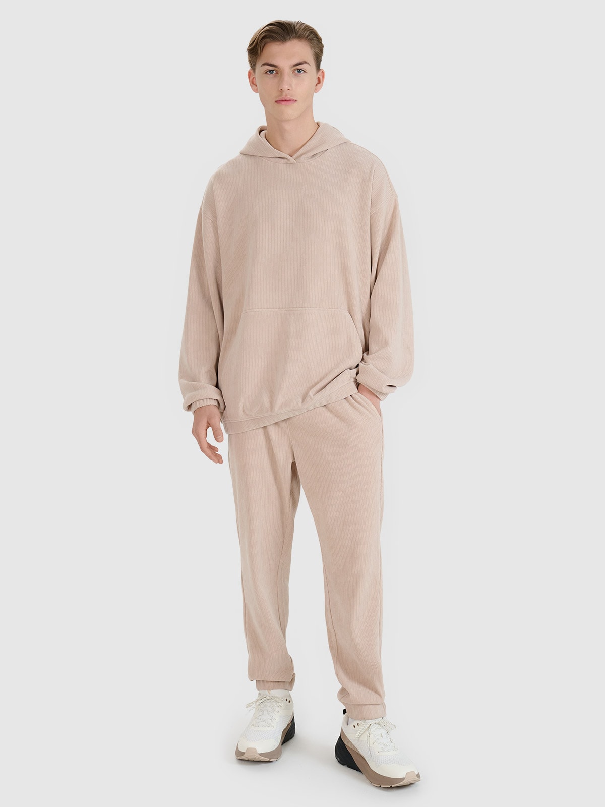 4F Spodnie dresowe joggery męskie - beżowe L