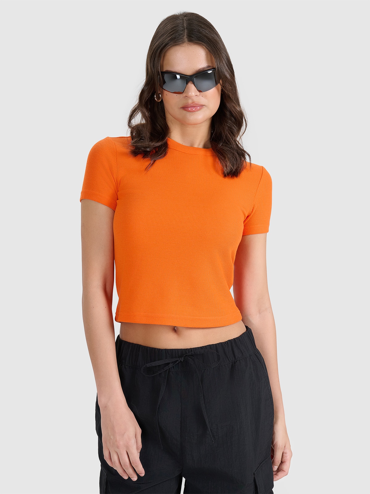 4F T-shirt slim z waflowej dzianiny damski - pomarańczowy L