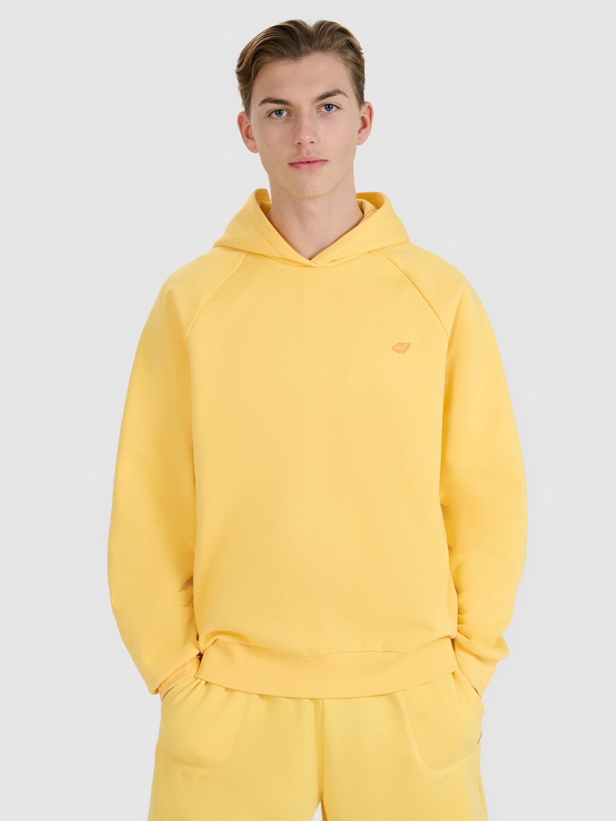 4F Bluza dresowa nierozpinana z kapturem uniseks - zółta S
