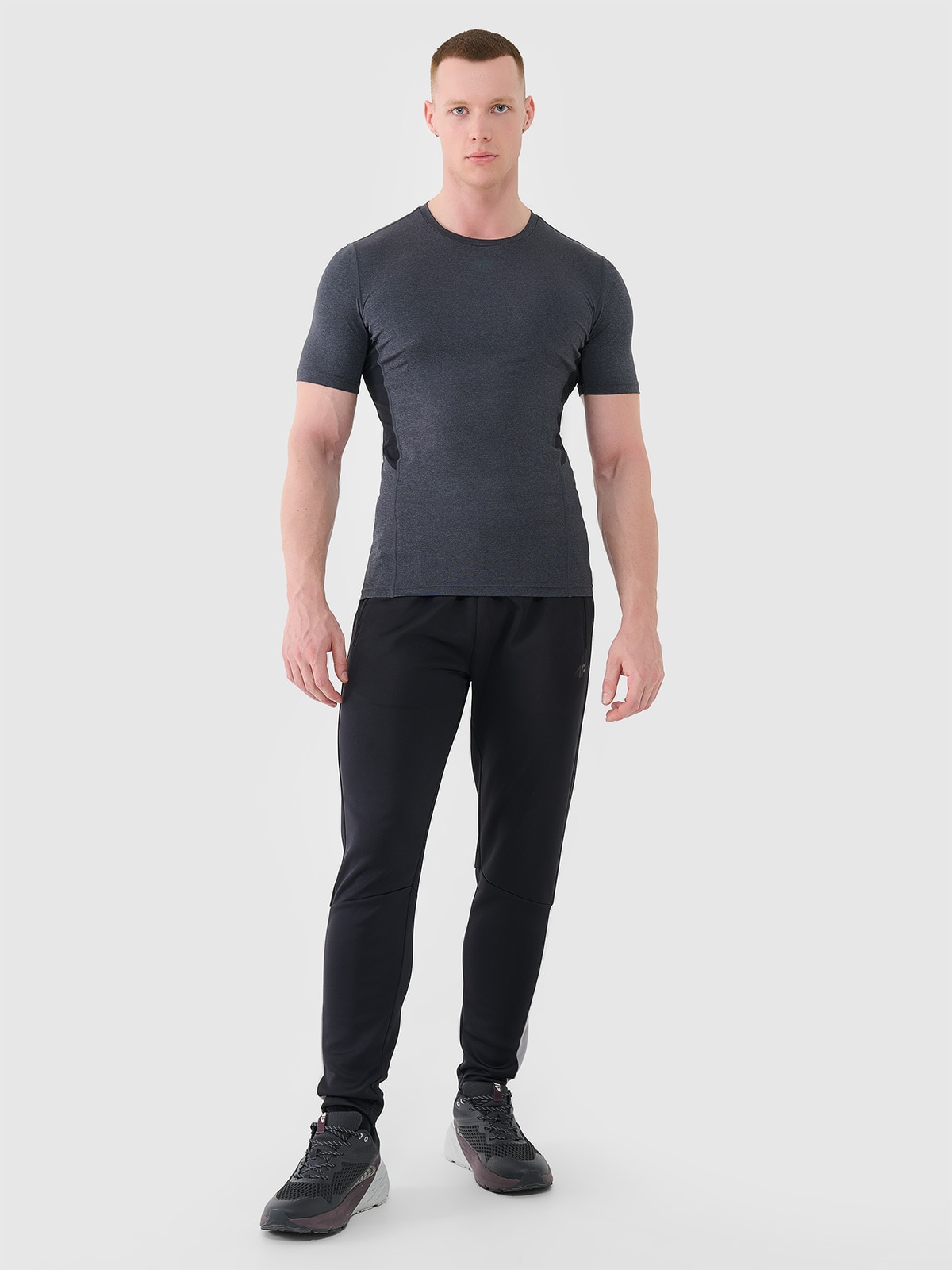 4F Spodnie treningowe szybkoschnące męskie - czarne L