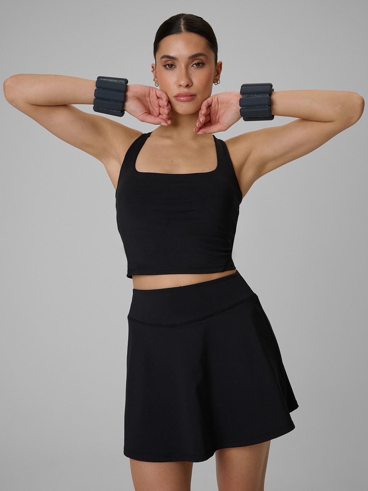 4F Crop top treningowy slim szybkoschnący damski - czarny XS