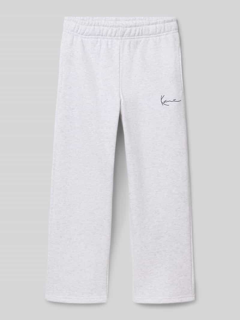 Spodnie dresowe o kroju straight fit z nadrukiem z logo