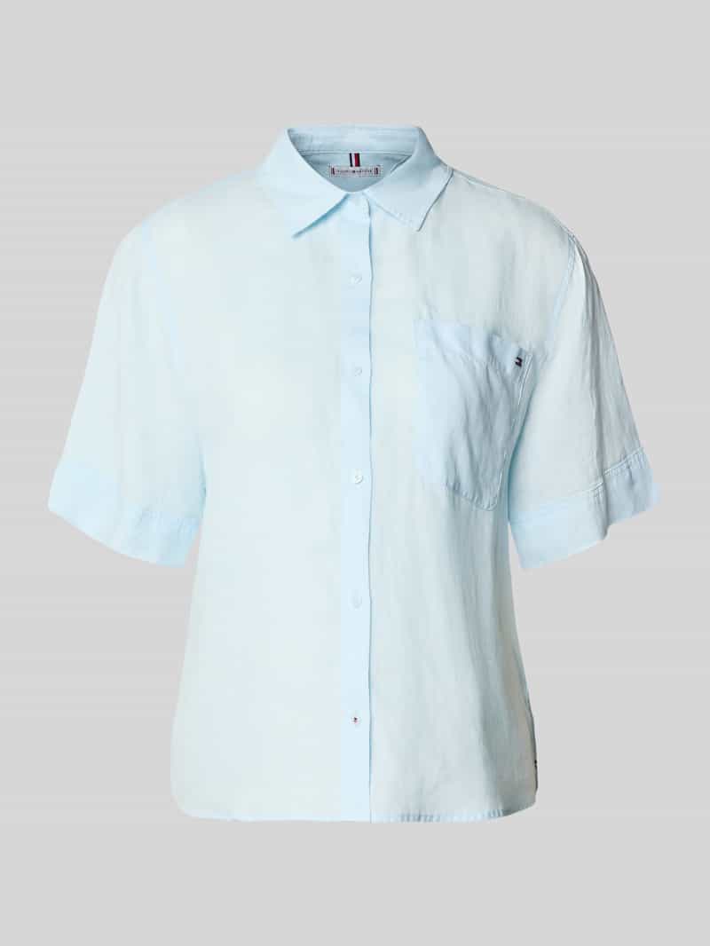 Bluzka lniana o kroju loose fit z brustaszą